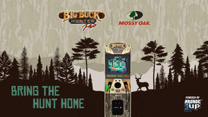 Product display with 'Big Buck Hunter' and 'Mossy Oak' logos, surrounded by forest silhouette and text 'Bring the Hunt Home'.