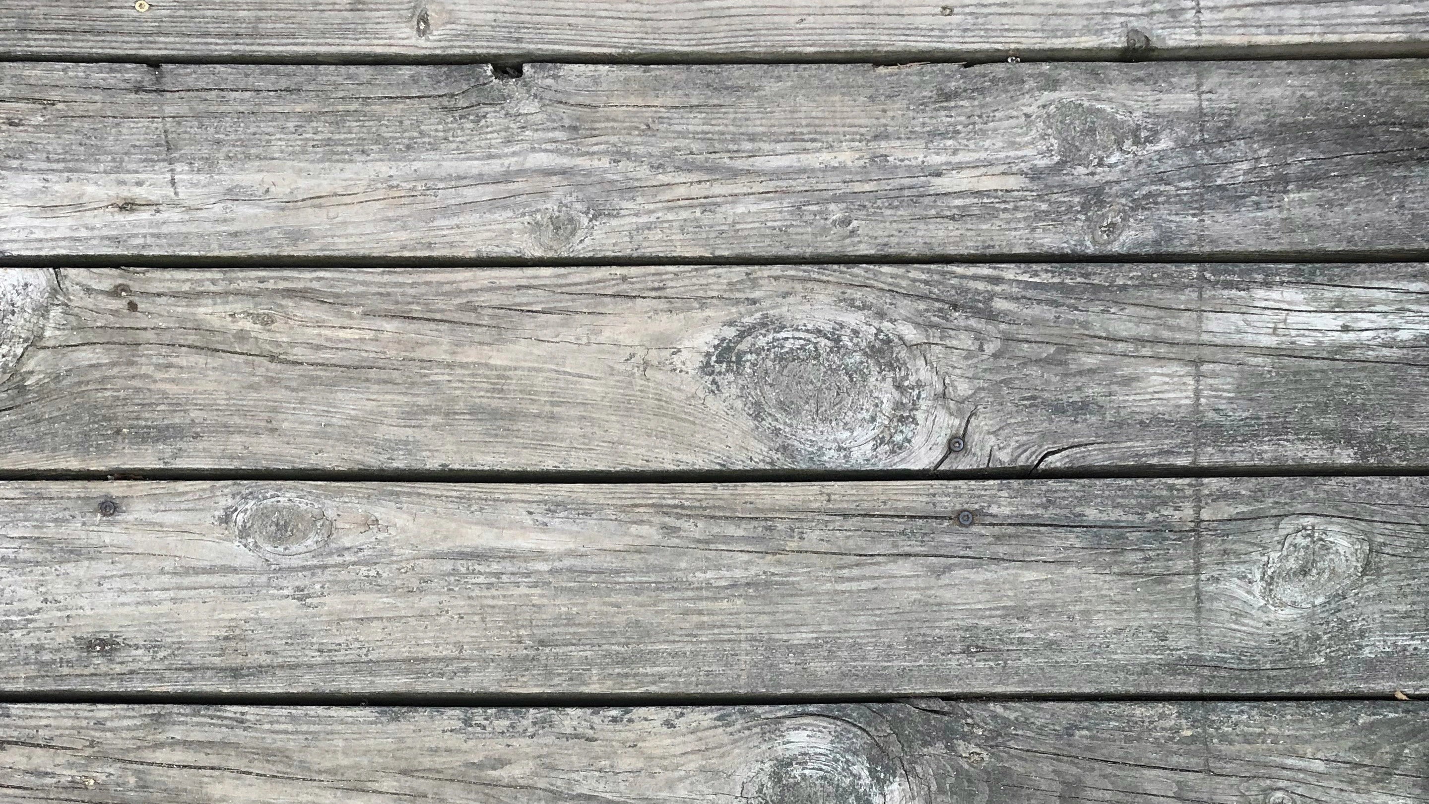 Close-up of a wooden deck with visible grain and texture