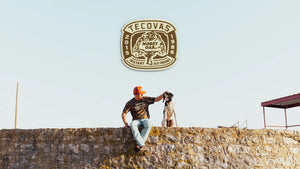 Mossy Oak x Tecovas guy and dog
