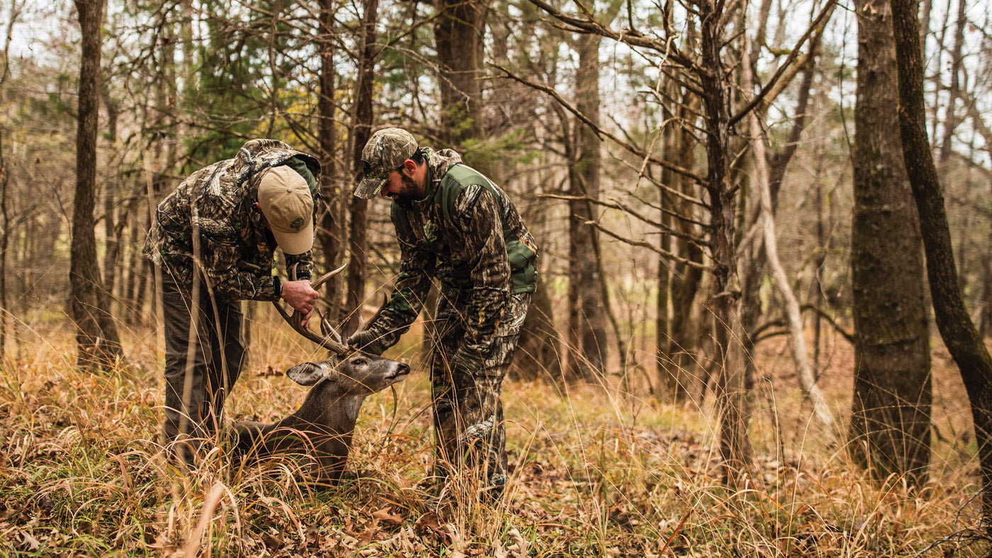 Two guys cherishing their buck down